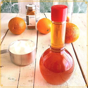 bottle of orange liqueur with ingredients