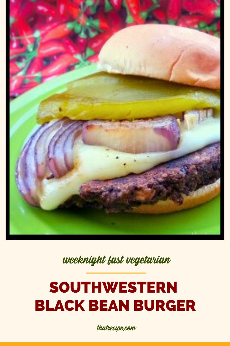burger topped with chili and grilled red onion slice