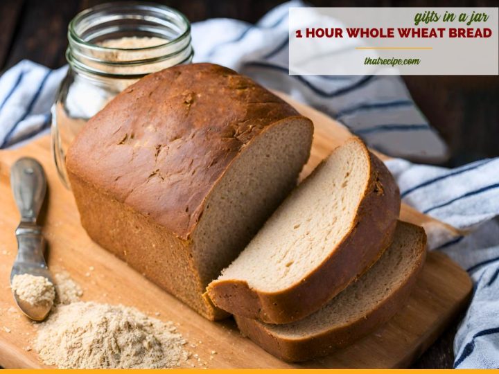 loaf of sliced whole wheat bread on a cutting board